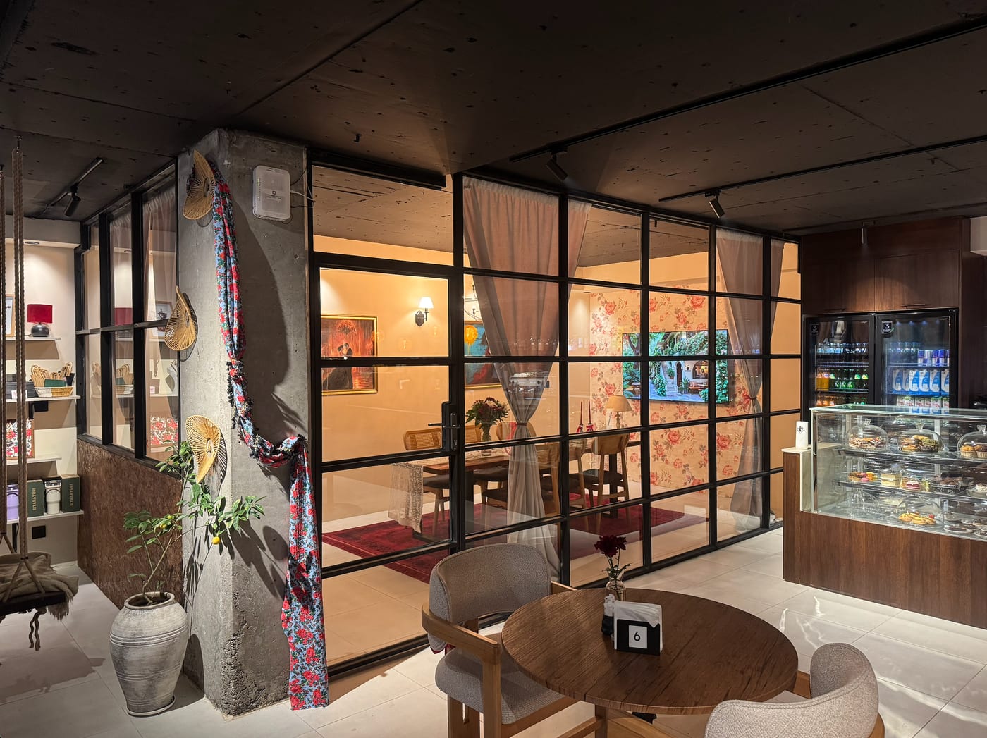 View of Kurdila café with private room and pastry display